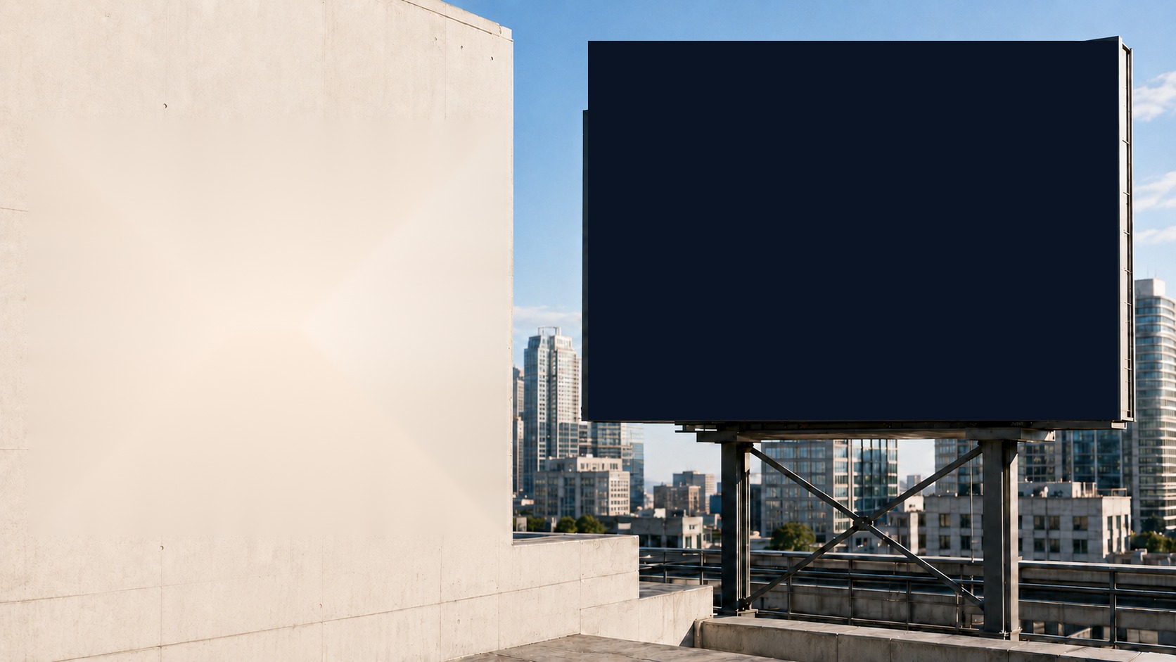 An empty billboard on a city rooftop